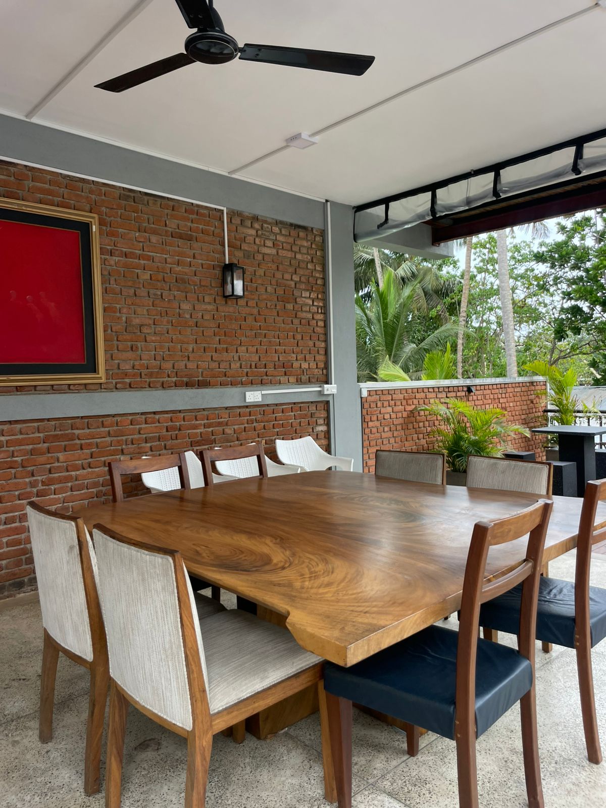 Group Dining - Ko Lake Villa boutique lakefront accommodation on Koggala Lake Sri Lanka: Our flexible dining area allows you to enjoy around a single table or multiple couple tables.
This poolside, open-plan raised area catches the lake breezes. It is fitted with overhead fans and supplemented by stand fans.