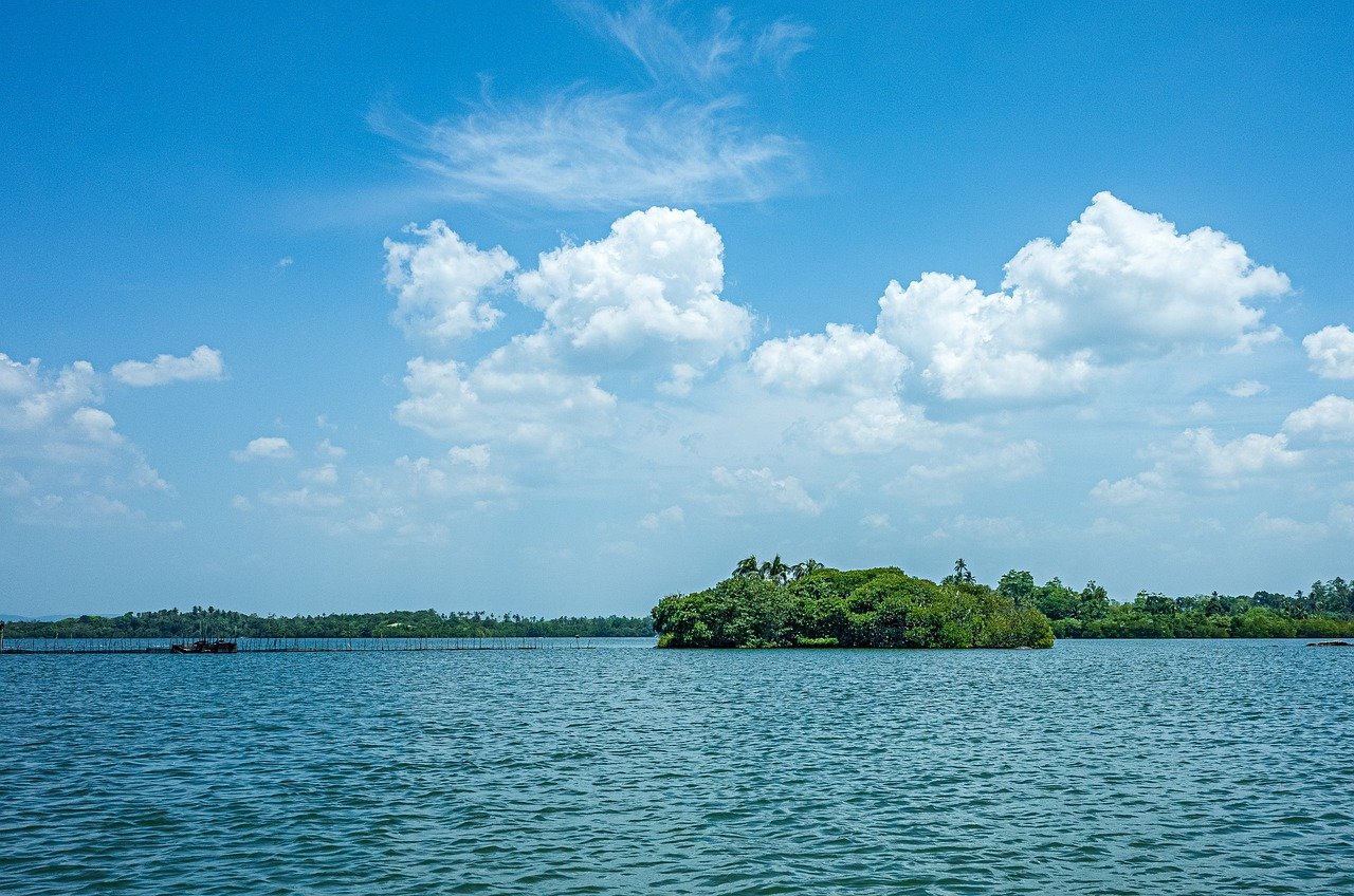 Koggala mangrove Island with Blue Sky & Clouds - Ko Lake Villa boutique lakefront accommodation on Koggala Lake Sri Lanka: On the Koggala lake where sea-plane land as it ferries fortunate tourist and business people across the island