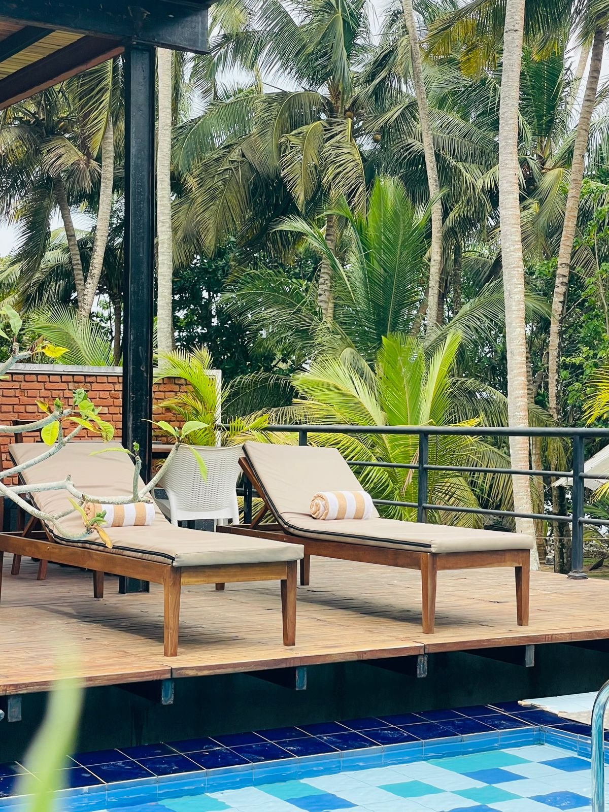 Poolside KoLake Sunbathe Poolside - Ko Lake Villa boutique lakefront accommodation on Koggala Lake Sri Lanka: Loungers next to Ko Lake pool