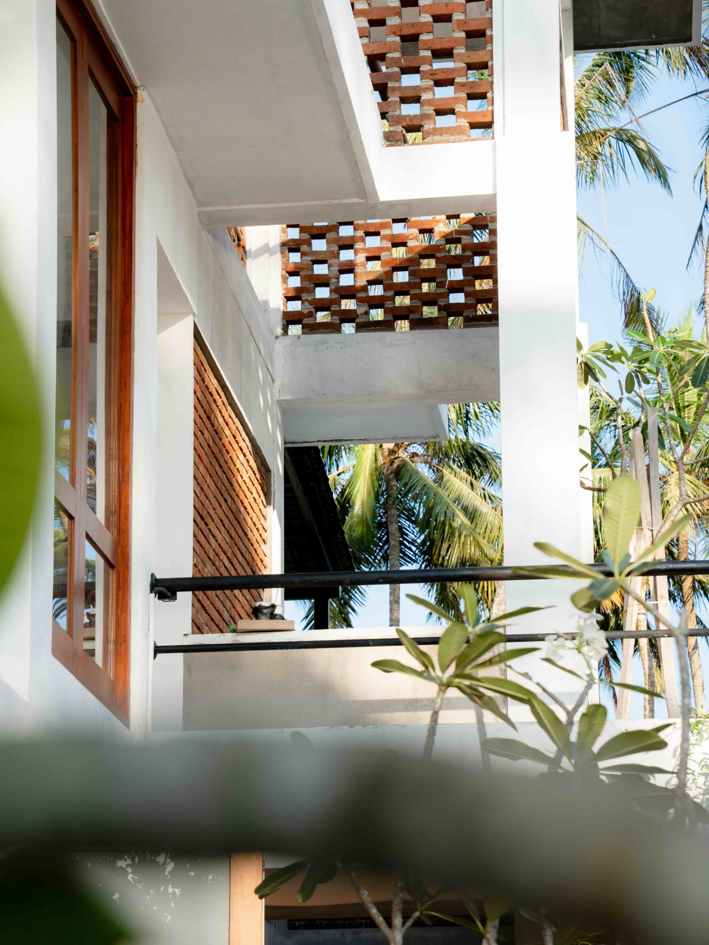 Ko Lake modern tropical airy architecture: Brick & Palm Views - Ko Lake Villa boutique lakefront accommodation on Koggala Lake Sri Lanka: KoLake provides an eclectic mix of modern buildings' exterior with intricate brickwork, lush palm trees, and natural light and breezes
Perfect for architecture and tropical design.