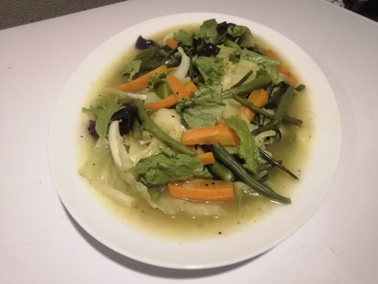 Healthy Vegetable Stir-fry: Fresh & Vibrant Green Veggies - Ko Lake Villa boutique lakefront accommodation on Koggala Lake Sri Lanka: Delicious and nutritious vegetable stir-fry featuring green beans, carrots, cabbage, and leafy greens in a light, savory sauce. Perfect for a healthy meal!